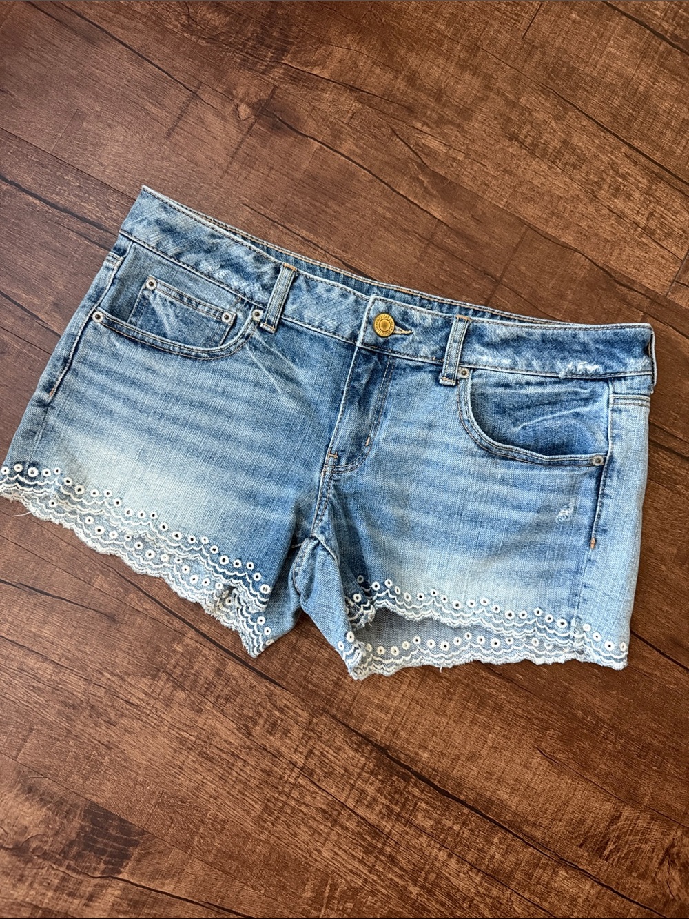 American Eagle denim shorts with eyelet hem details